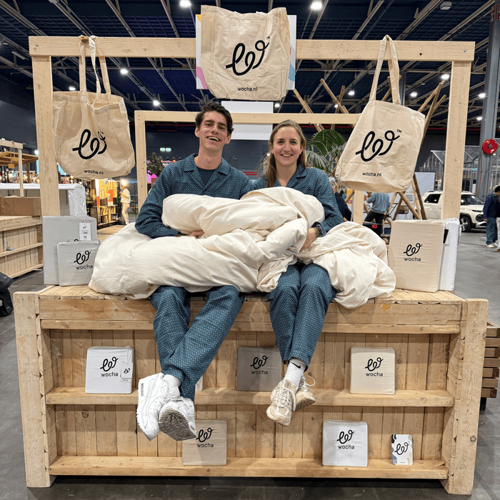 Wouter en Charlotte op de Wocha stand op de Impact Fair