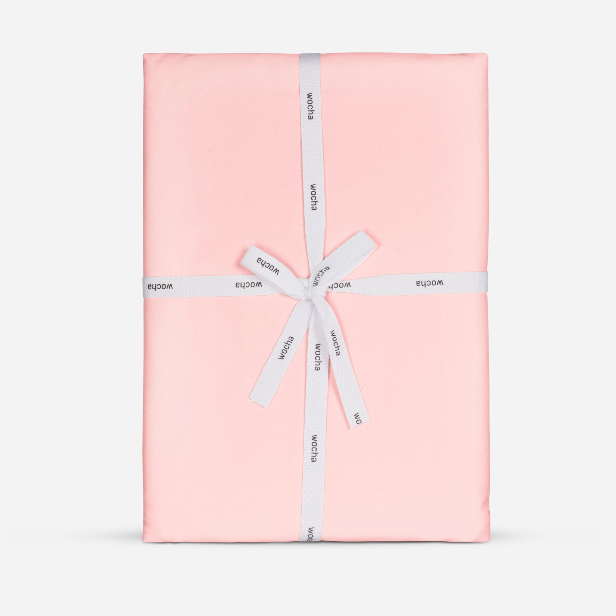 Roze Dekbedovertrekset in verpakking van Wocha