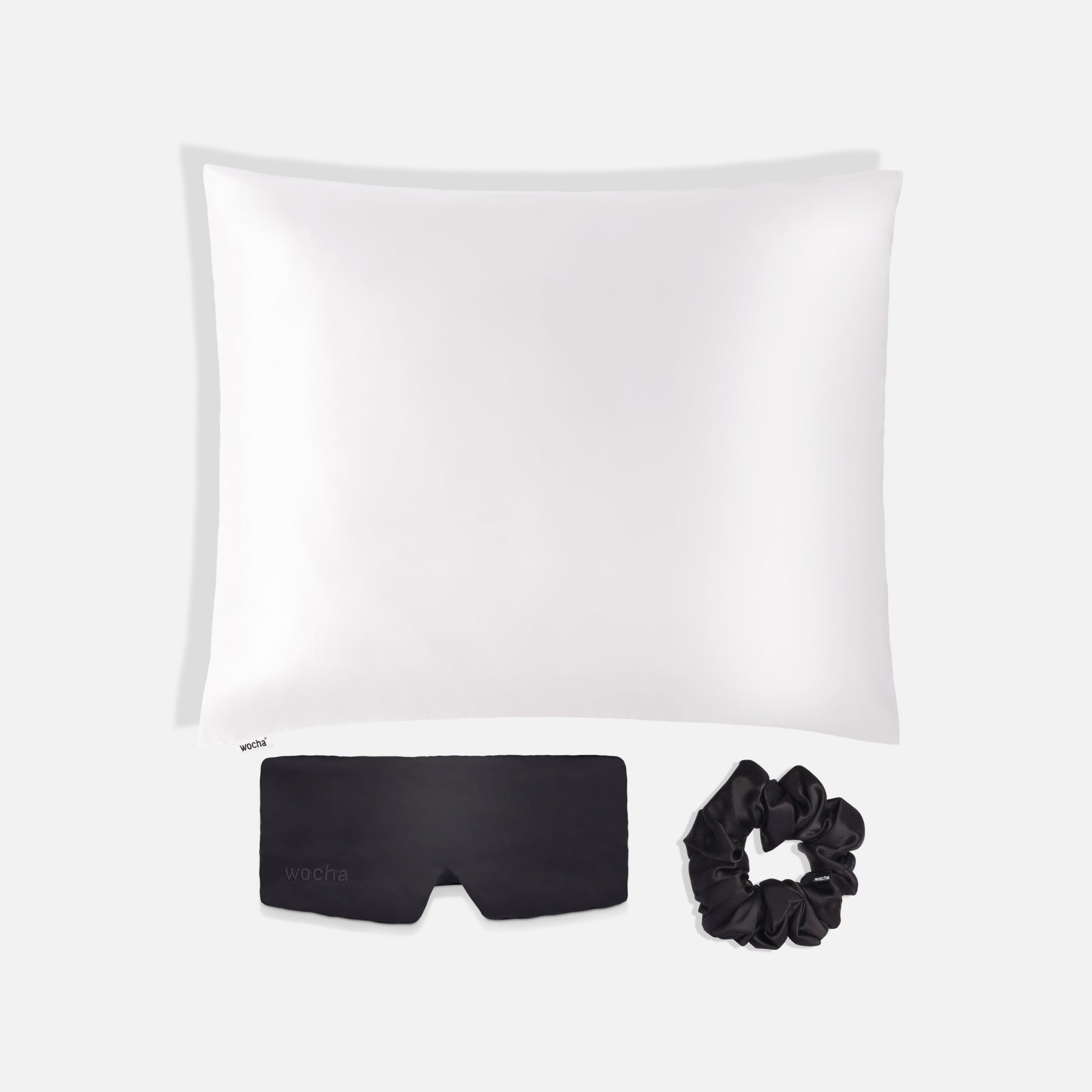 Bundel: Zijden kussensloop wit & Slaapmasker zwart & Scrunchie zwart -
Zijden slaapmasker met zijde van hoge kwaliteit – lichtblokkerend en geschikt voor gevoelige huid